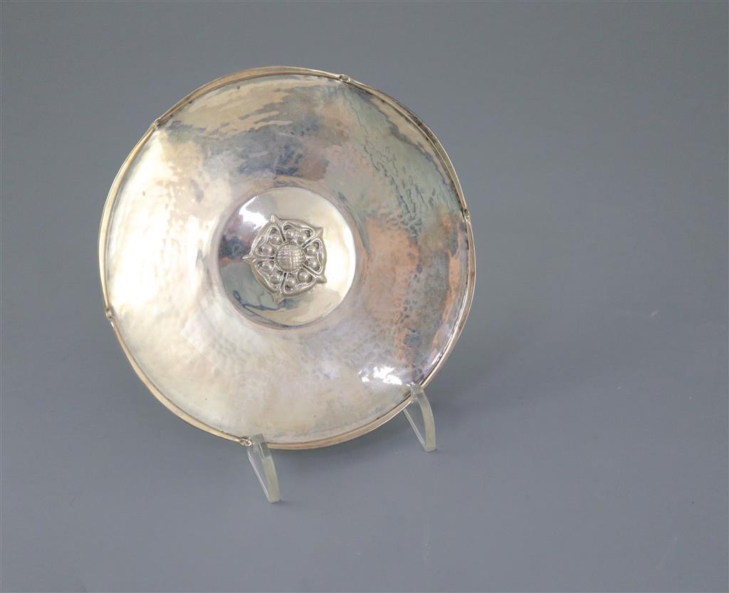 A George V Arts & Crafts Omar Ramsden planished silver Tudor Rose shallow dish,
